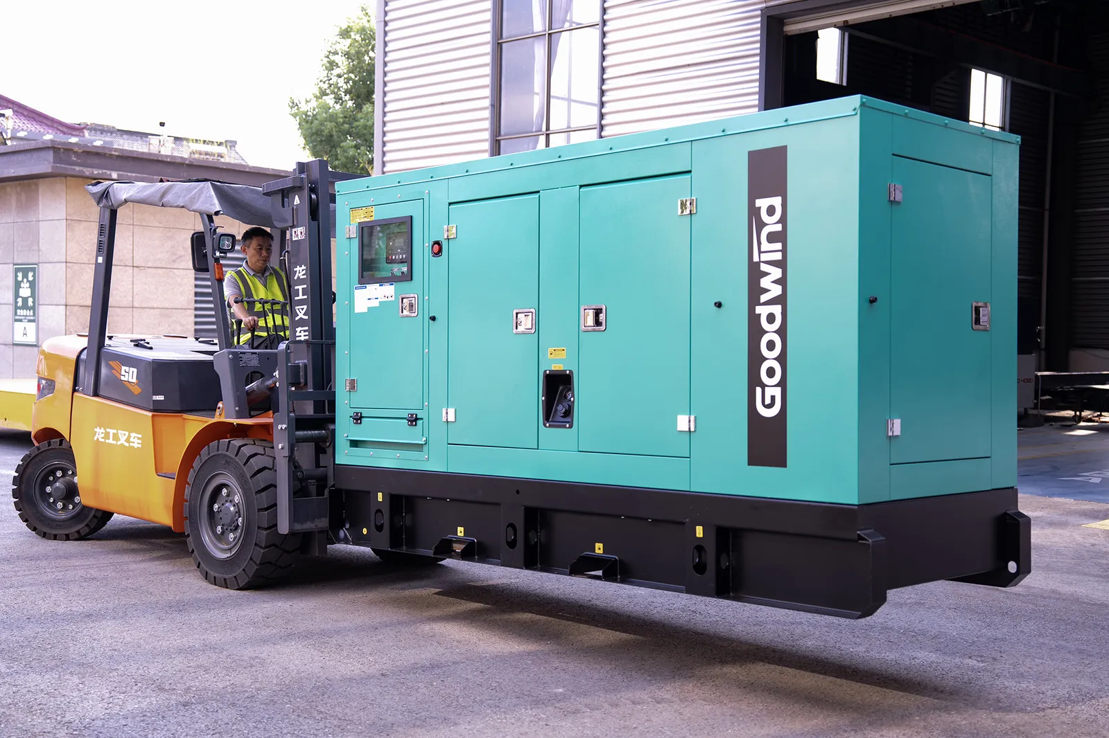Control side of the GOODWIND rental generator, with forklift pockets visible in the base